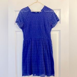 Free People purple lace mini dress. Lace overlay and sheer cap sleeves. Size 6